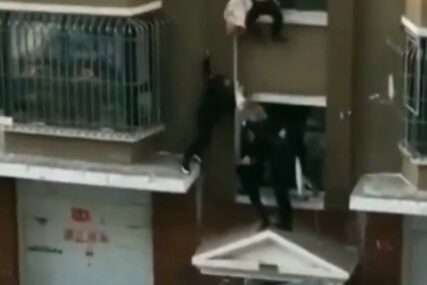 PRAVI HEROJ Dostavljač mlijeka uhvatio bebu koju je majka bacila s prozora zbog požara u stanu (VIDEO)