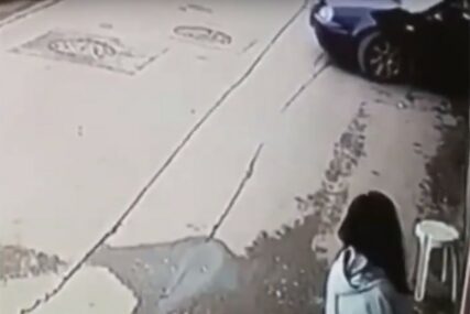 SNIMAK BIJEGA Jedan lopov opljačkao banku, drugi ga čekao u automobilu (VIDEO)