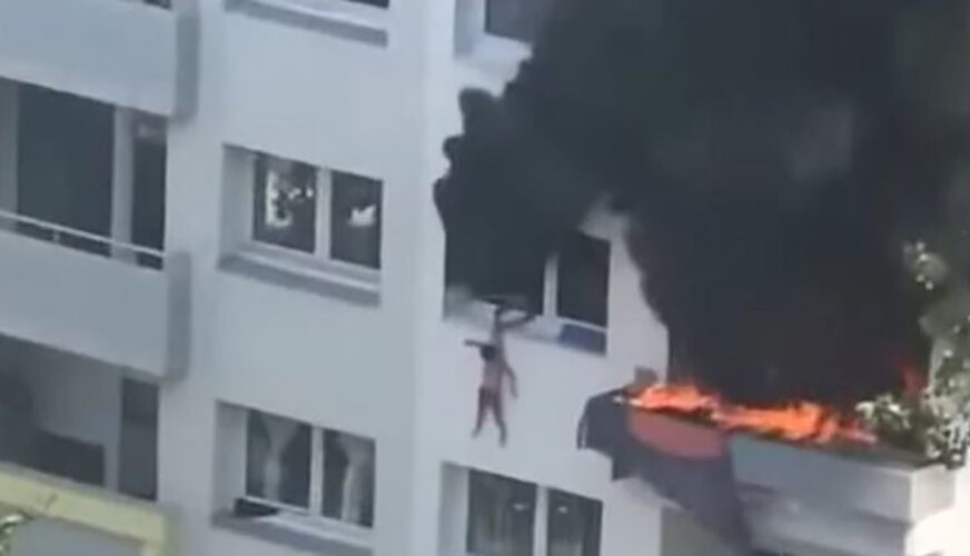 VISILI S PROZORA Dva mališana se spasla od požara SKOKOM SA ZGRADE (VIDEO)