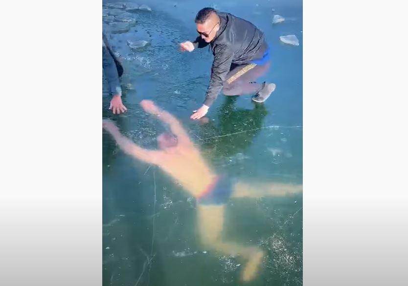 PANIČNO TRAŽIO IZLAZ Sportistu spašavali nakon što je zaronio u zaleđeno jezero (VIDEO)