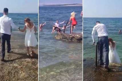 NEOBIČNO VJENČANJE Mladenci sa svatovima nakon ceremonije uskočili u more (VIDEO)