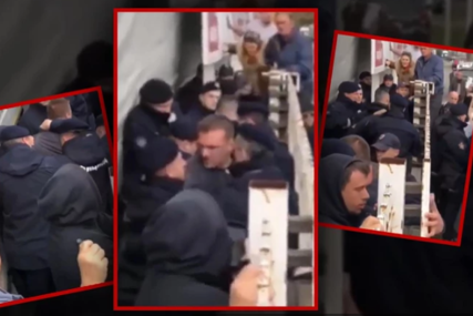 KORDON POLICIJE ISPRED AUTOSERVISA Vlasnik uhapšen nakon protesta, odbio da se iseli sa parcele  (VIDEO)