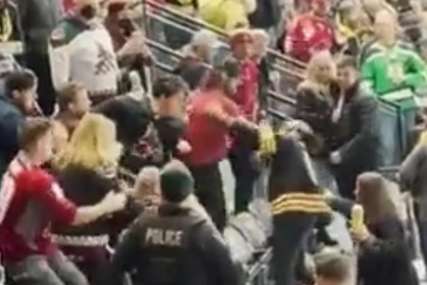 TUČA NA UTAKMICI NHL-a Navijači podivljali, muškarac udarao ženu u glavu (VIDEO)