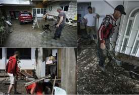 “SVE NAM JE UNIŠTENO” Nakon besane noći mještani Teslića čiste poplavljene kuće, puteve i dvorišta (FOTO)