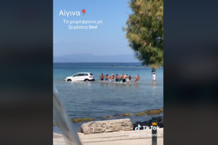 POVUCI, POTEGNI Automobil u moru, kupači spašavali "škodu", snimak postao viralan (VIDEO)