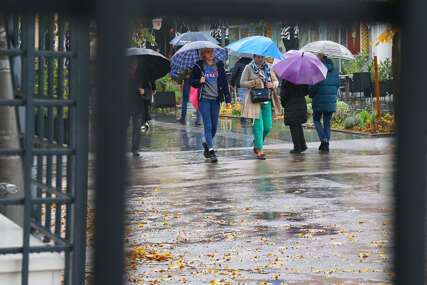 kiša vrijeme kišobran građani