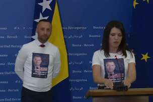 natpisi na majicama posvećeni Dodiku