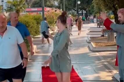 (VIDEO) Hrvati postali hit na TikToku: Prolaznicima pod noge stavljali crveni tepih, reakcije ljudi su bile različite