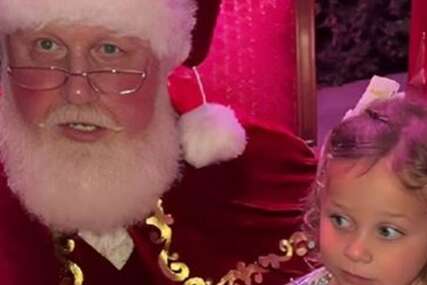 (VIDEO) VIRALNI HIT Devojčica odbila da sjedne u krilo Djeda Mrazu, a njegov genijalan odgovor izazvao lavinu komentara