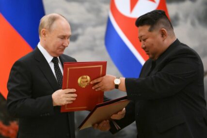  Vladimir Putin i Kim Džong Una