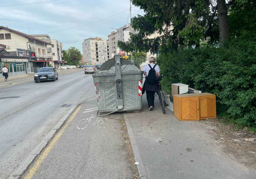 kontejner na trotoaru i biciklističkoj stazi Lauš