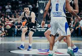 PARTIZAN NA KORAK OD TITULE Crno-bijeli prelomili Budućnost u posljednjoj četvrtini i poveli u finalnoj seriji