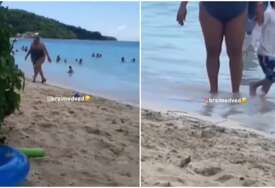 (VIDEO) "SKIDAM JOJ KAPU, NA ŠTIKLAMA PO PIJESKU" Ova žena se na plaži pojavila u neobičnom izdanju, pljušte komentari