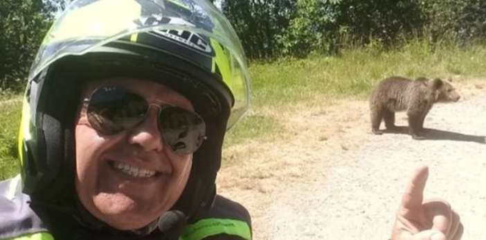 (FOTO) SNIMIO SVOJE POSLJEDNJE SEKUNDE ŽIVOTA Muškarac pokušao da nahrani mečiće, medvjedica ga rastrgla na komade