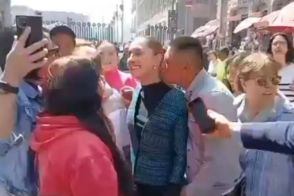 (VIDEO) POKUŠAO DA JE UHVATI ZA GRUDI Muškarac poljubio meksičku predjsednicu u vrat, ona pokušavala sakriti neprijatnost