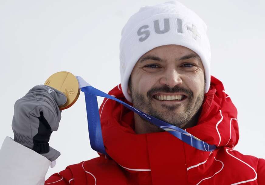 Loik Mejar sa zlatnom olimpijskom medaljom