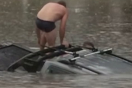 (VIDEO) SEKUNDE SU GA DIJELILE OD SMRTI Novinar i prolaznik spasili vozača iz automobila koji je tonuo